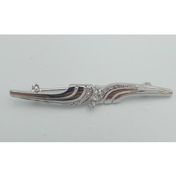 Silver brooch with zircons