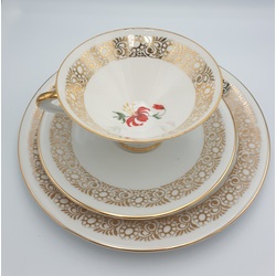 Porcelain cup with 2 saucers