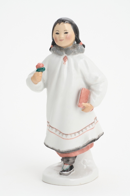 Figure. Nanai (Yakut) with a flower (first day of school)