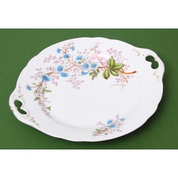 Фарфоровая тарелка Кузнецова с цветами.