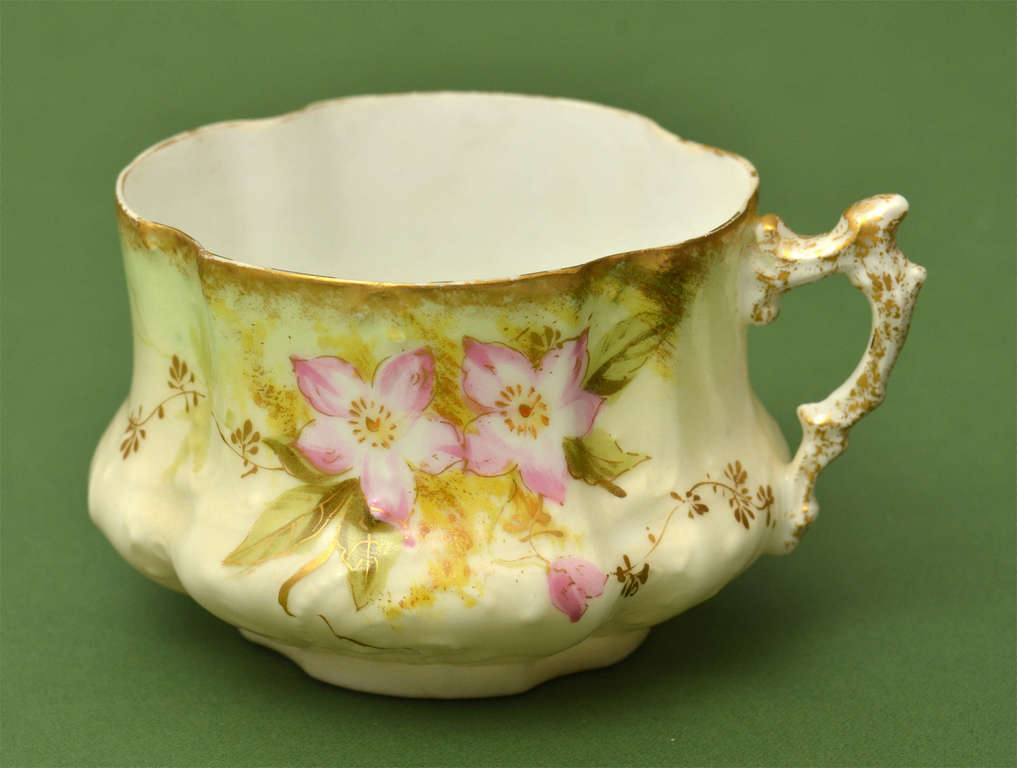 Cup with a flower motif