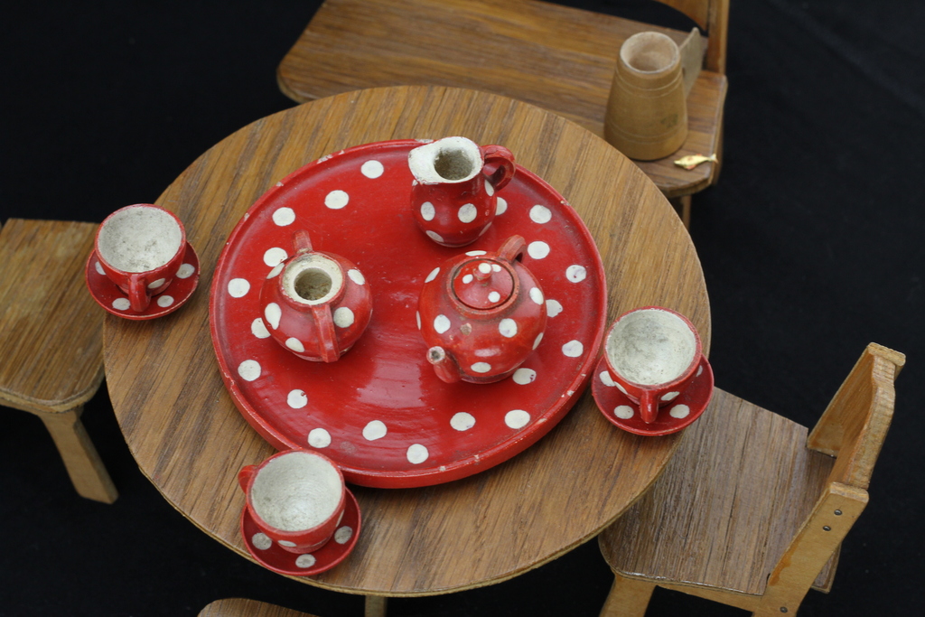 Doll table with chairs and tableware