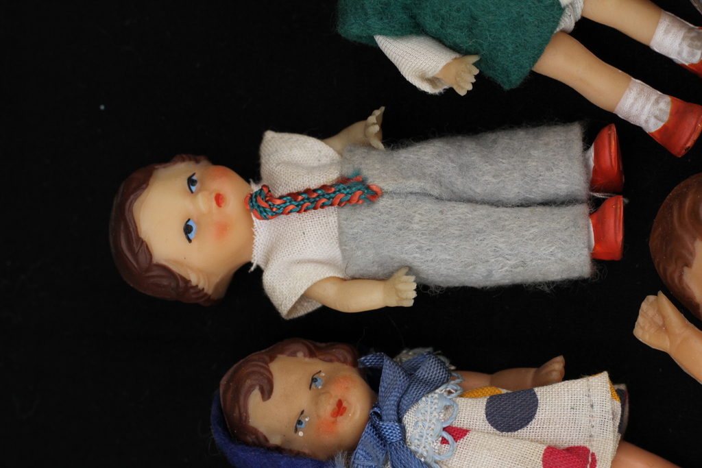 Set of 7 miniature dolls