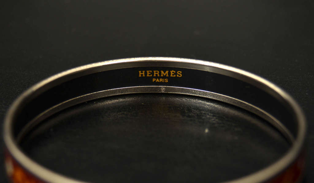 Hermes silver bracelet with variously colored enamel