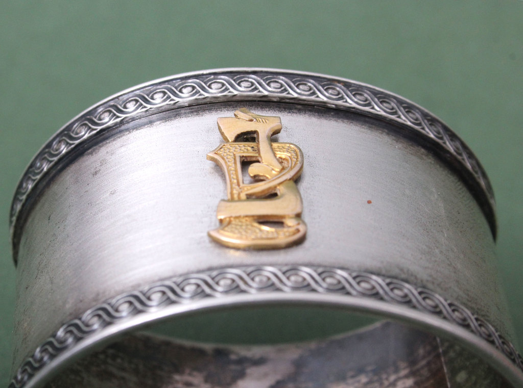 Silver napkin ring with gold lining