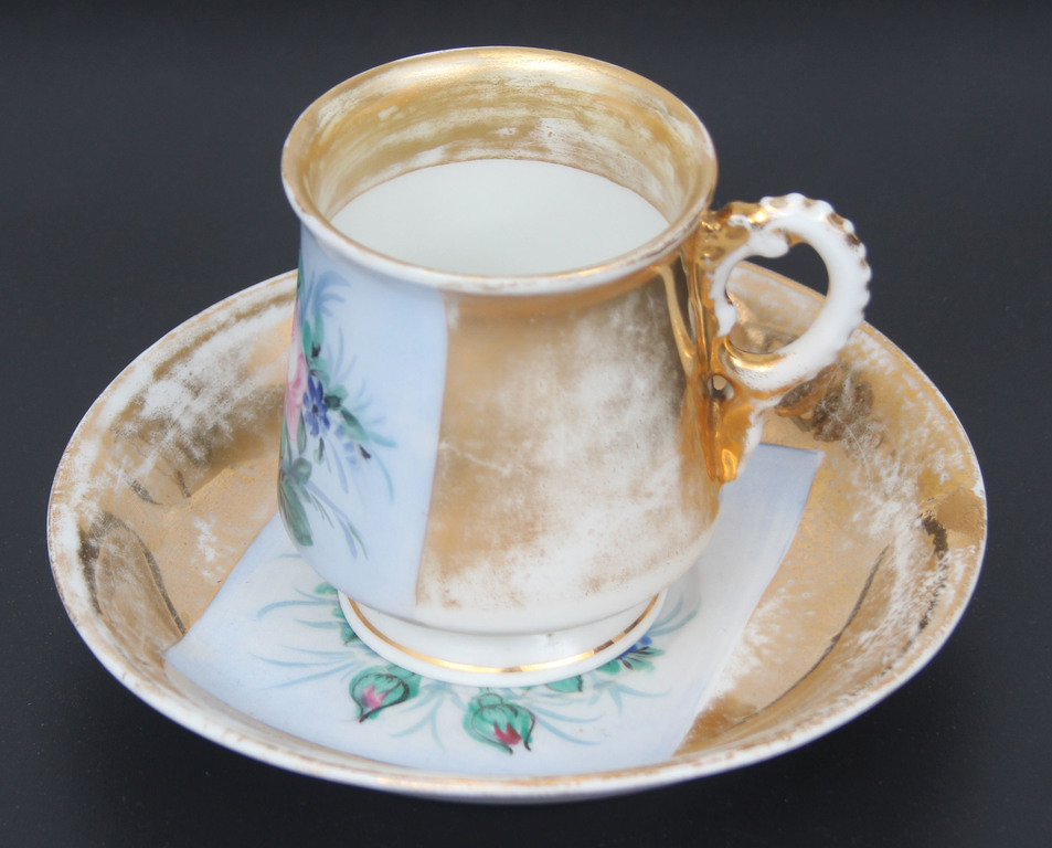 Porcelain cup with saucer 