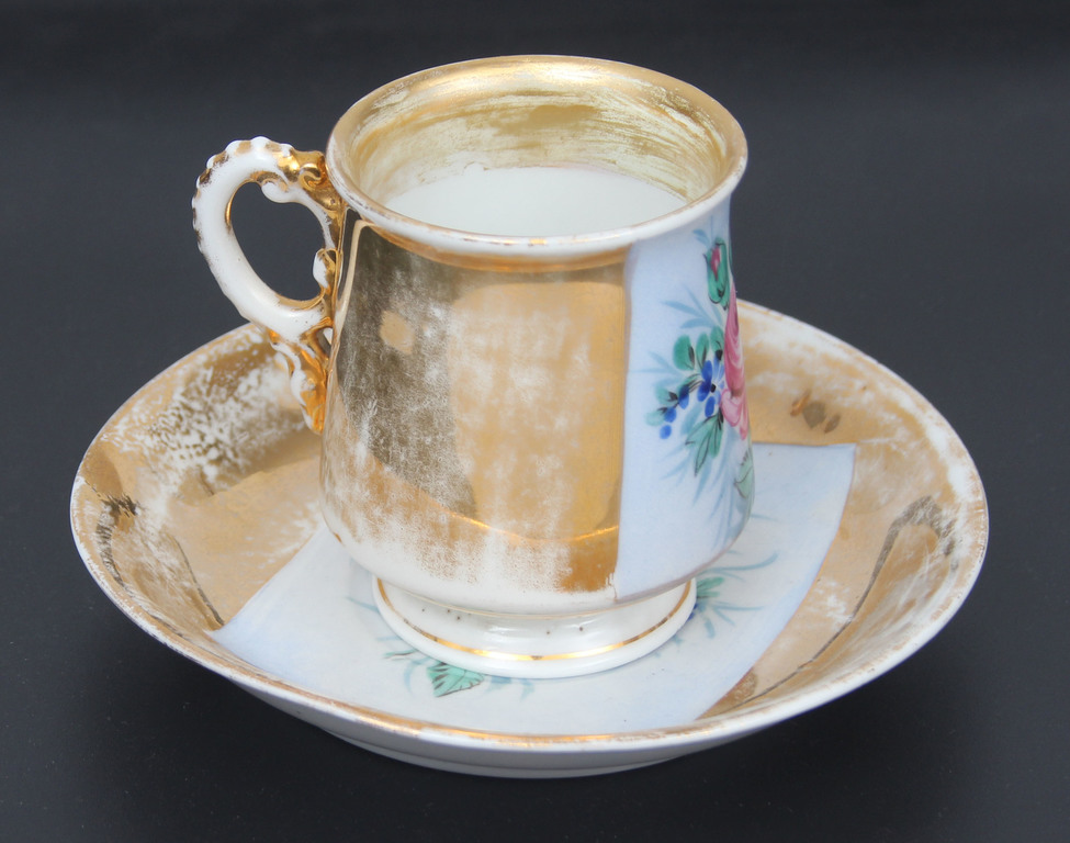 Porcelain cup with saucer 