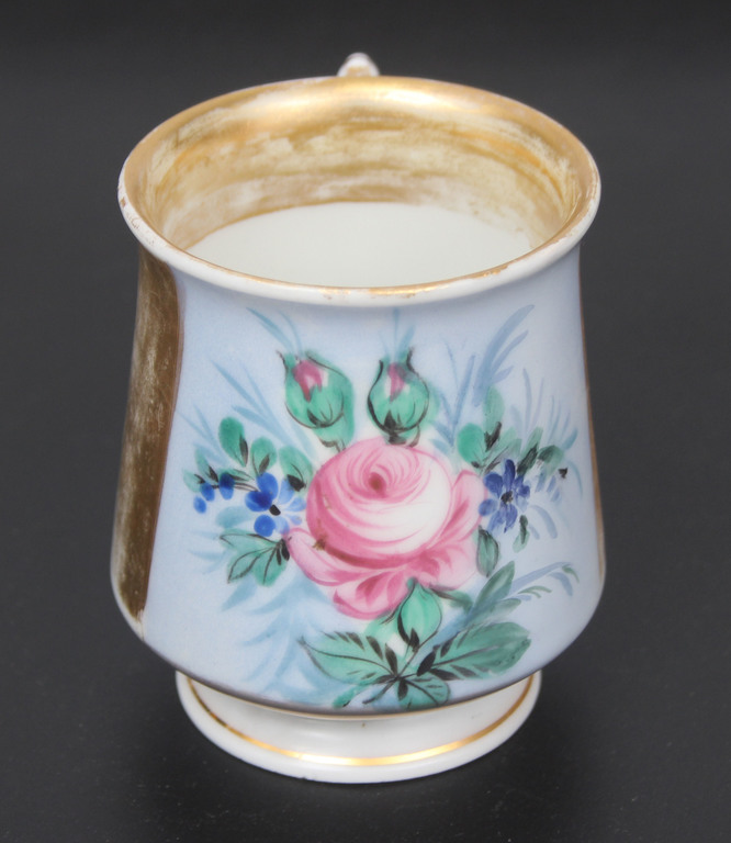 Porcelain cup with saucer 