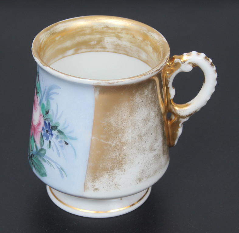 Porcelain cup with saucer 