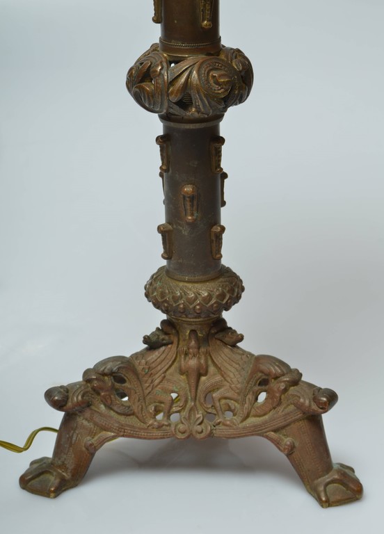 Bronze lamp with a glass 