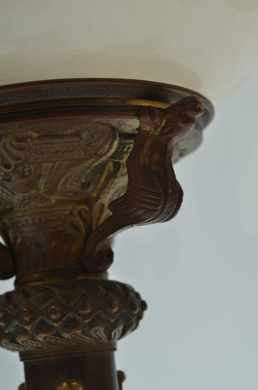 Bronze lamp with a glass 