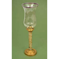 Brass candle holder with glass dome