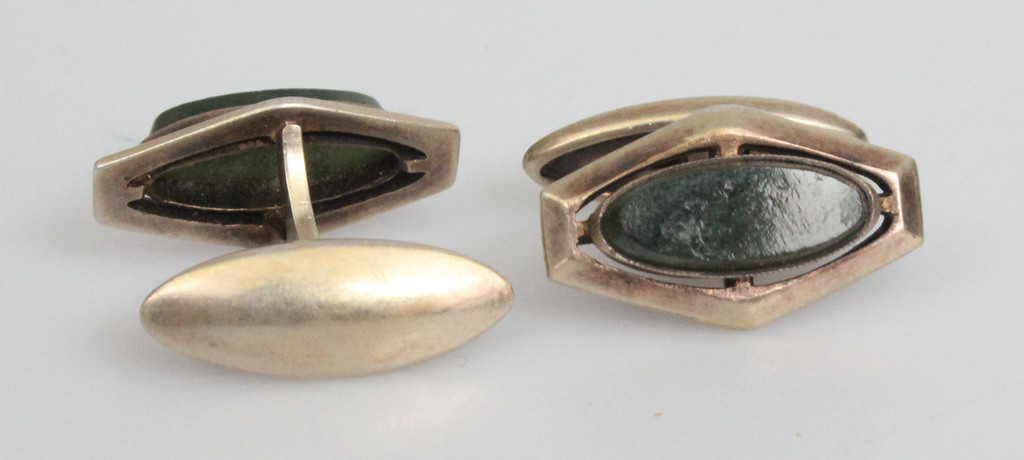 Silver cufflinks with embedded stone
