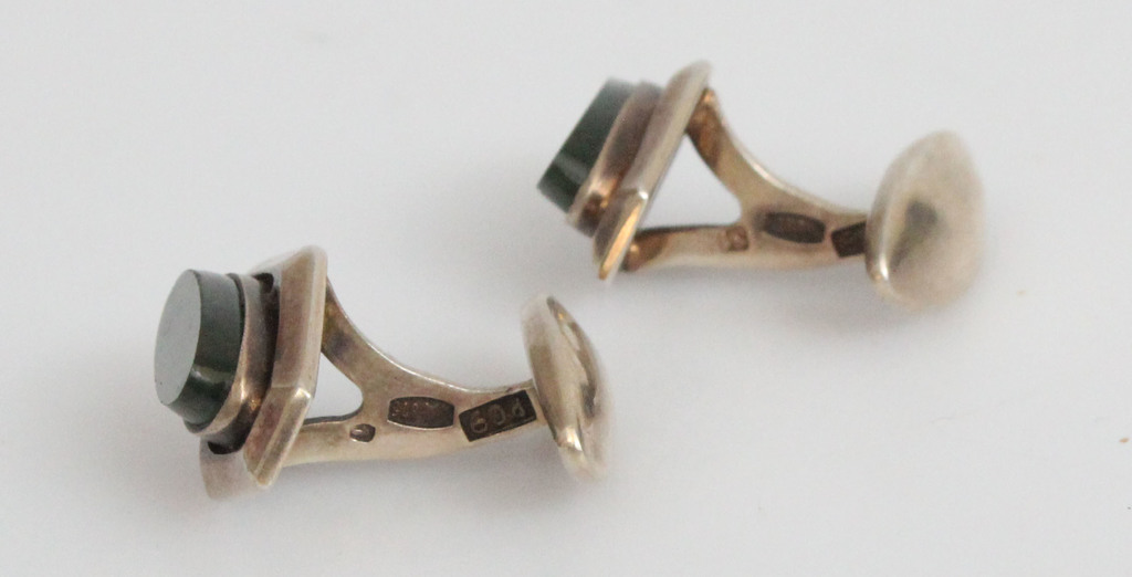 Silver cufflinks with embedded stone