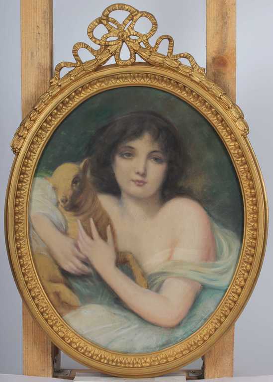 Portrait of a girl with a lamb