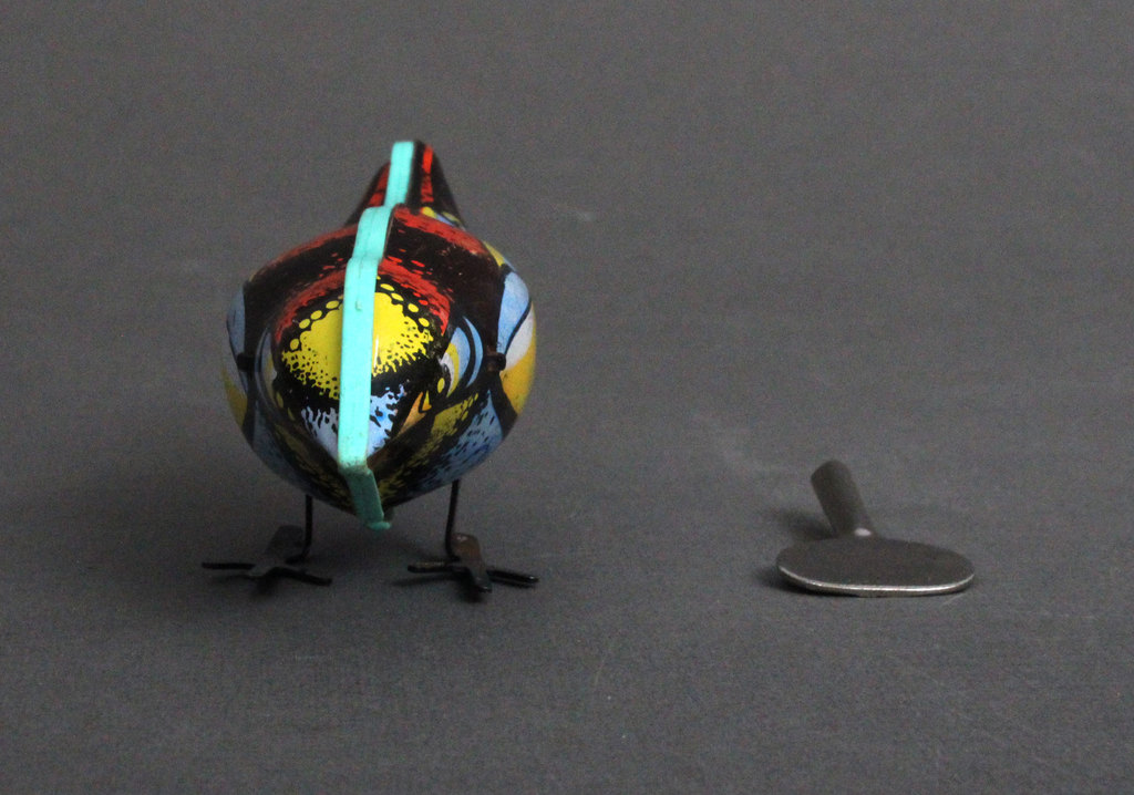 A wind up metal bird
