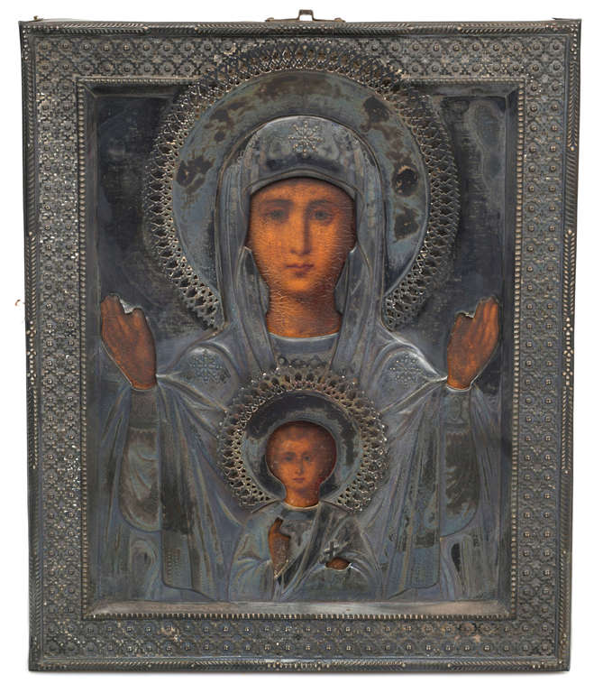 Wooden icon with silver finish and the censer