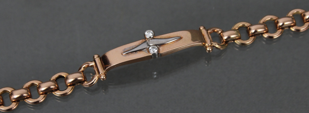 Women's gold bracelet with two diamonds
