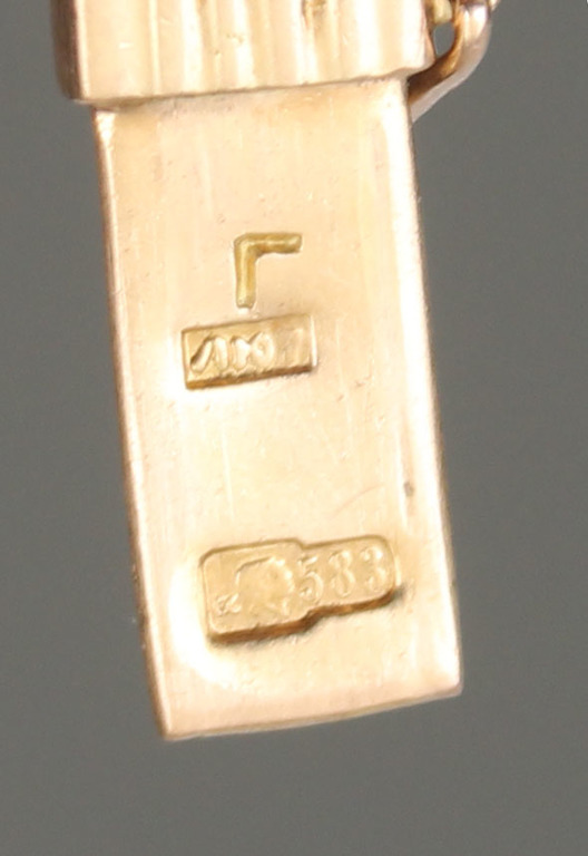 Women's gold bracelet with two diamonds
