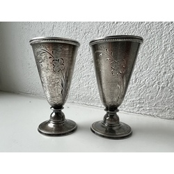 Two silver wine glasses