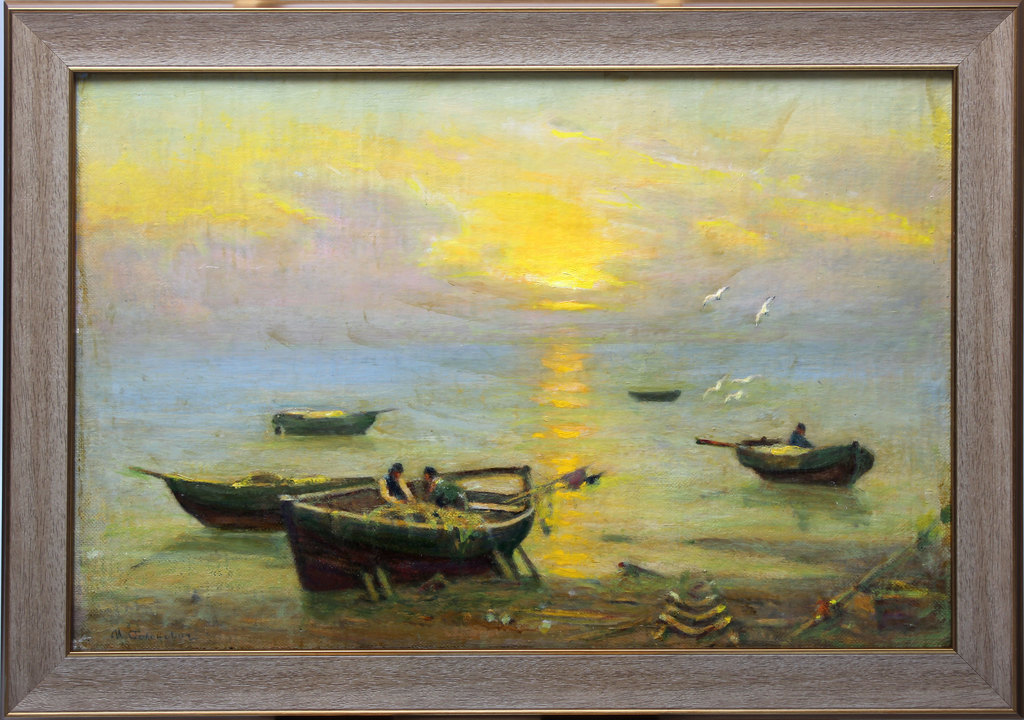 Fishing boats in the sea at sunrise