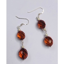 Silver earrings with polished (diamond cut) Amber