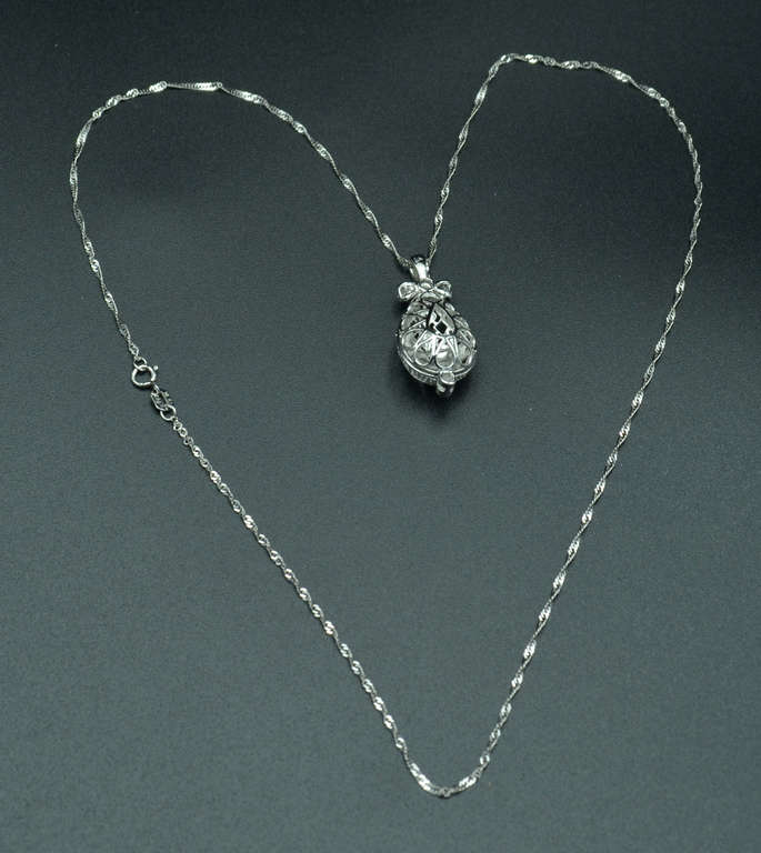Faberge style white gold egg pendant with chain