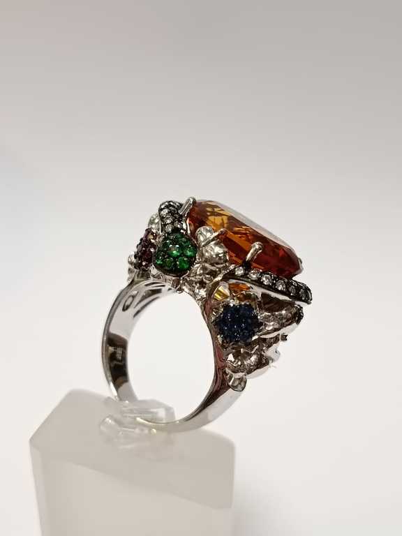 Gold ring with diamonds, rubies, sapphires, tsavotites and citrine