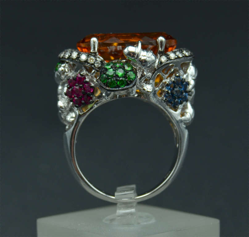 Gold ring with diamonds, rubies, sapphires, tsavotites and citrine