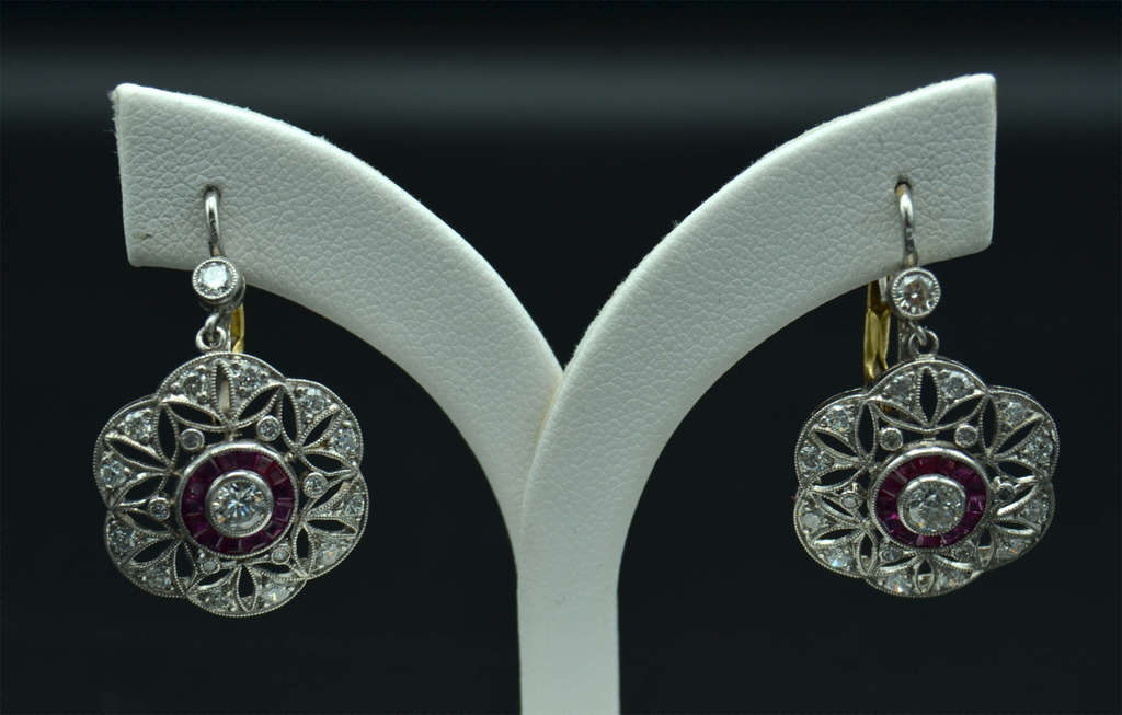 Platinum and gold earrings with 40 natural diamonds and 27 natural rubies