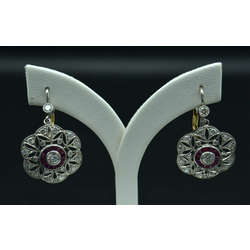 Platinum and gold earrings with 40 natural diamonds and 27 natural rubies