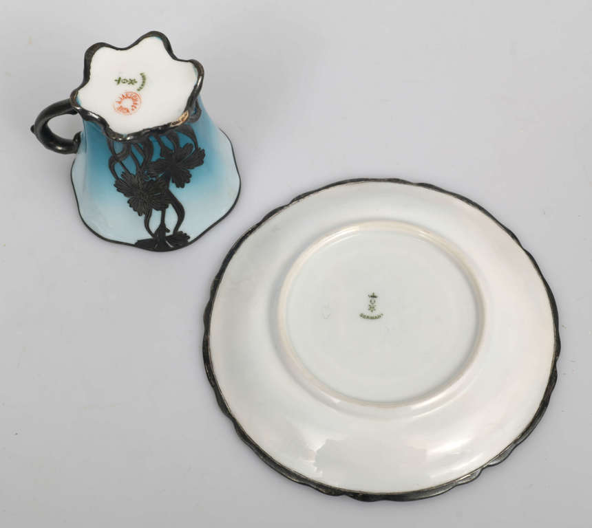 Art Nouveau porcelain cup with saucer