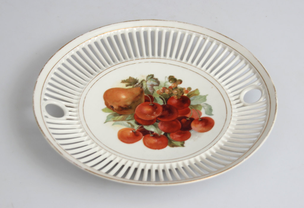 Decorative porcelain plate with a fruit motif