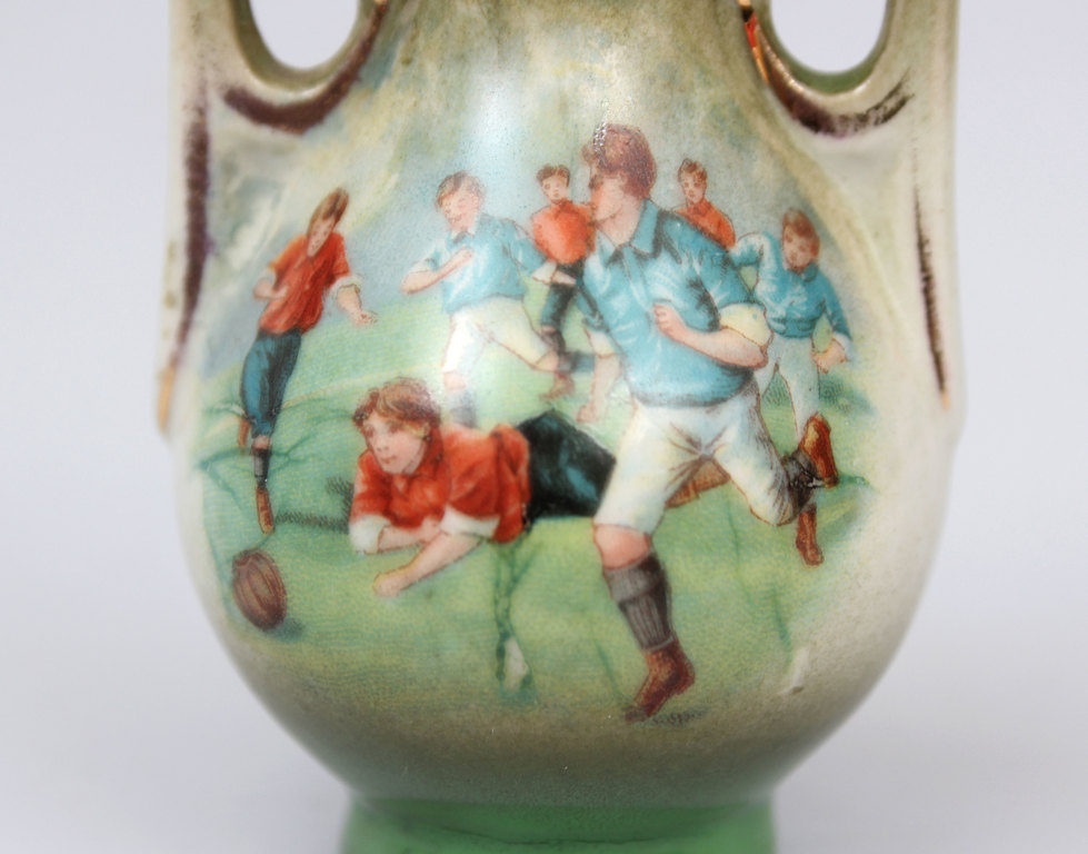 Jugendstil vase with a football motif