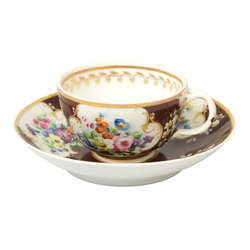 Porcelain teacup with saucer