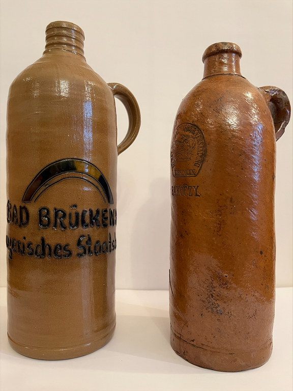 Two clay jugs of mineral water