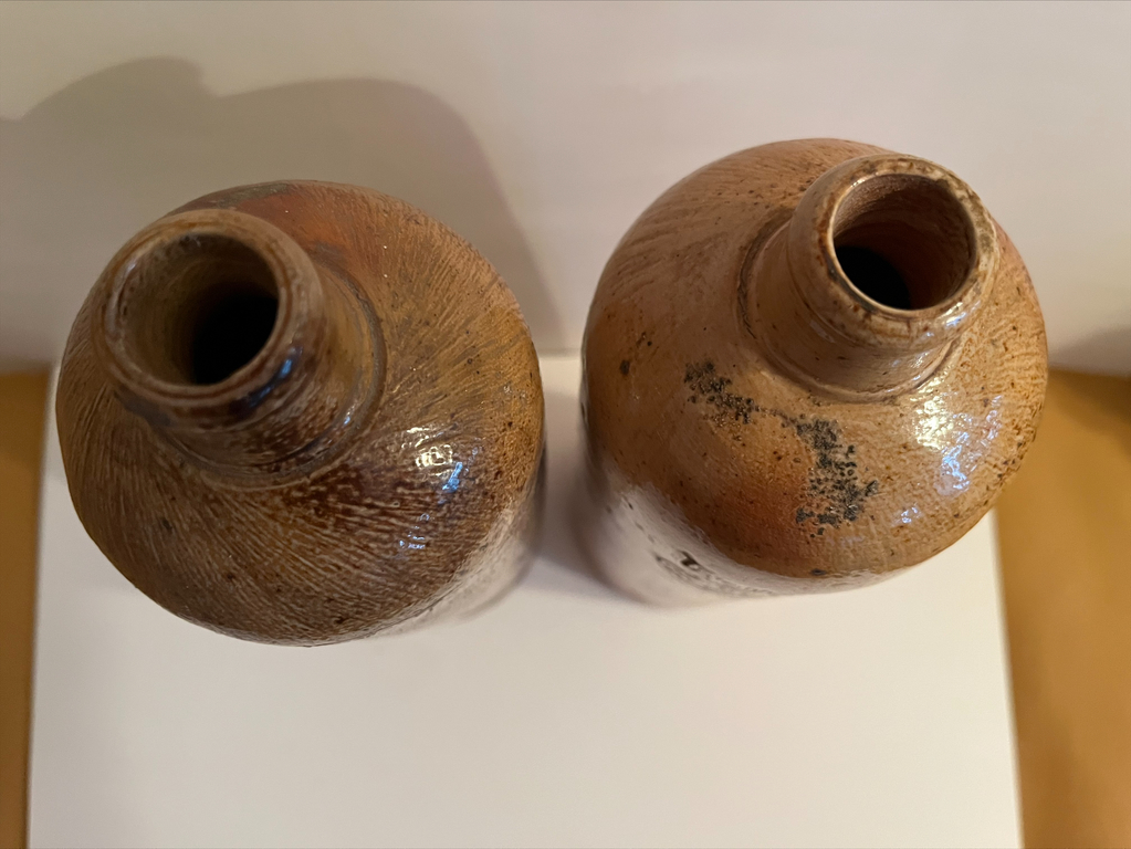 Two clay jugs for filling alcoholic beverages