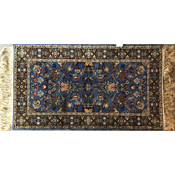 Handwoven blue wool rug