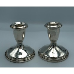 A pair of silver candlesticks