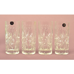 Set of four crystal glasses with labels