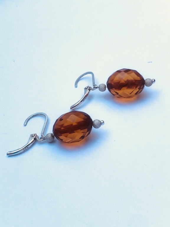 Silver earrings with natural amber, diamond cut