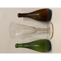 Beer bottles with a glass