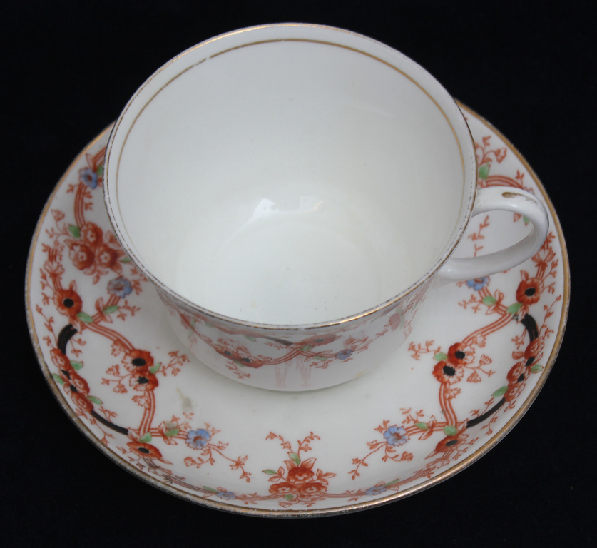 Porcelain cup with saucer