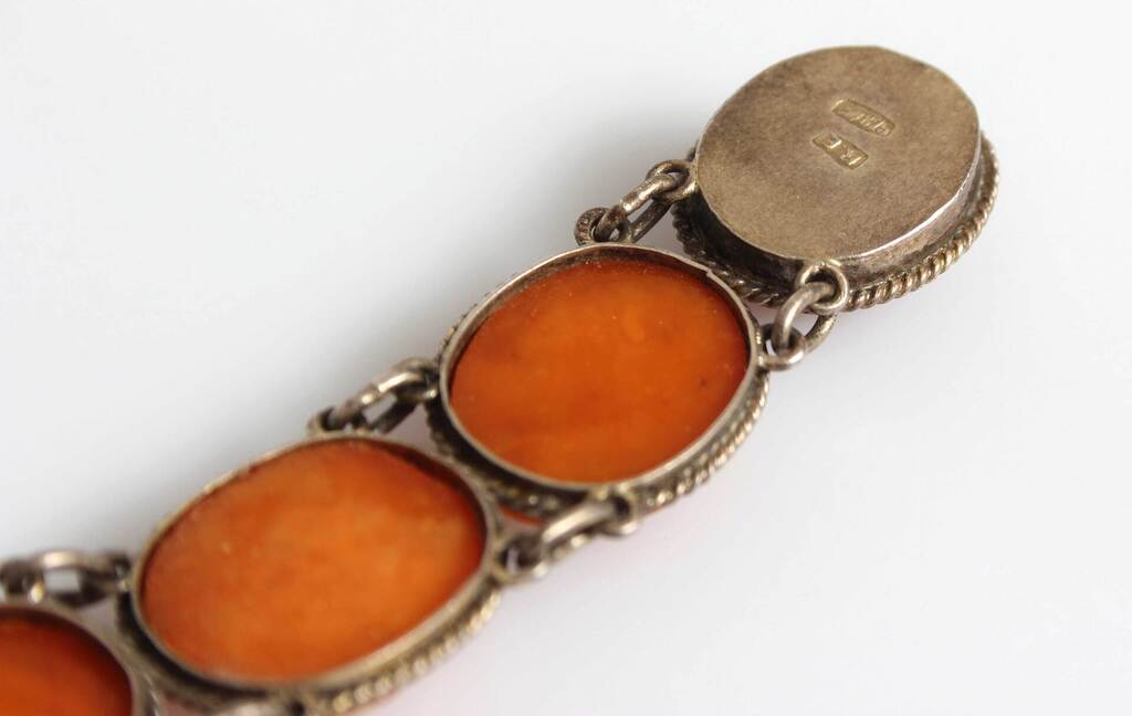 Amber bracelet in silver frame and cufflinks