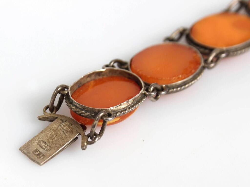 Amber bracelet in silver frame and cufflinks