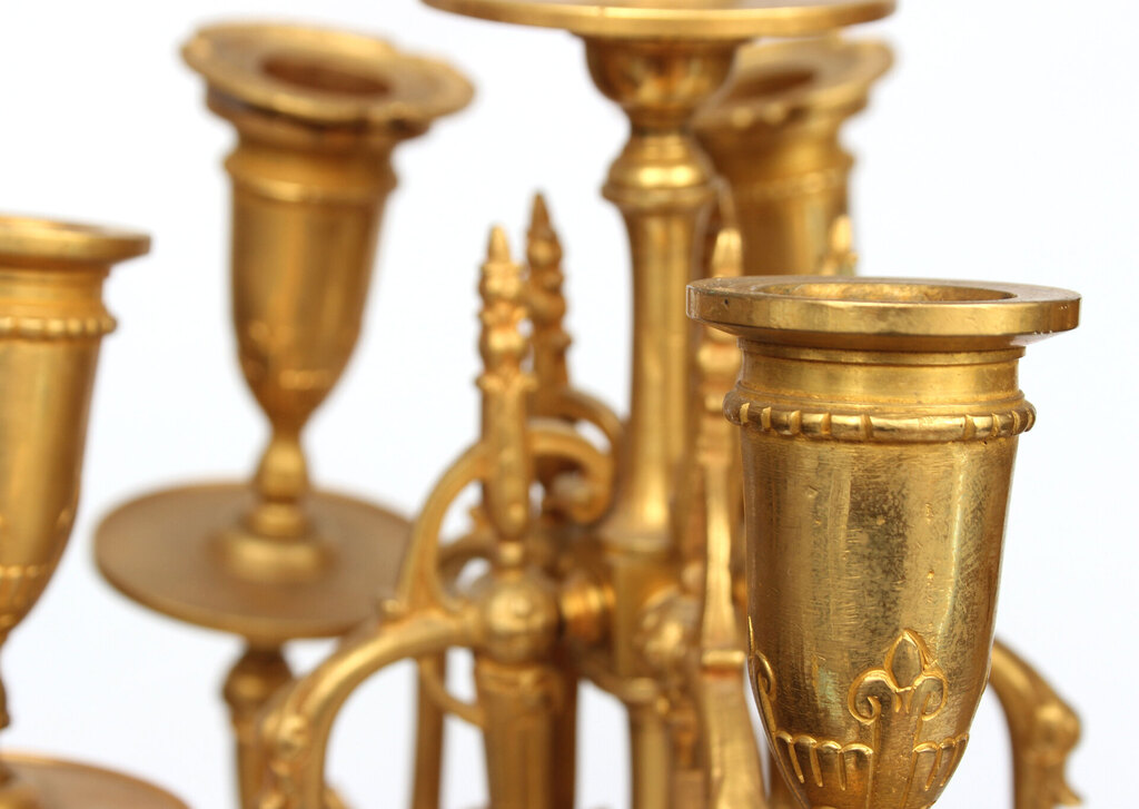 Bronze candlesticks with a stone base