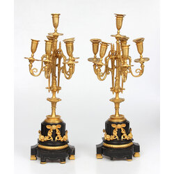 Bronze candlesticks with a stone base