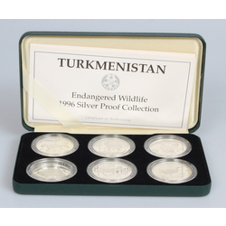 A set of Turkmenistan silver coins with engraved wild animals