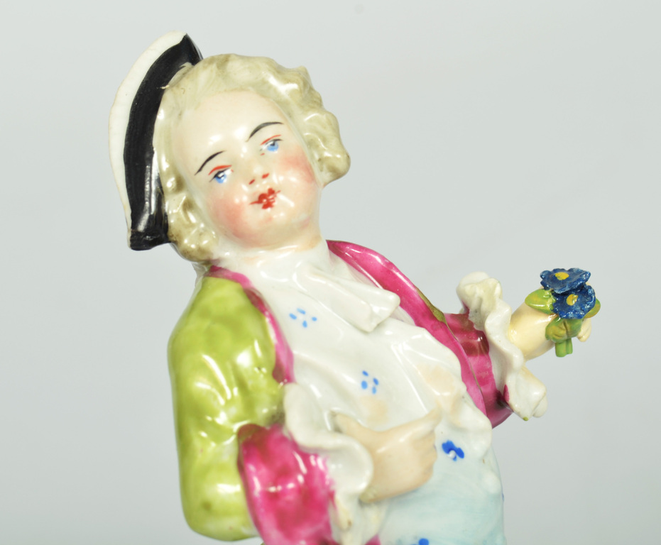 Two porcelain figurines A Lady and a gentleman