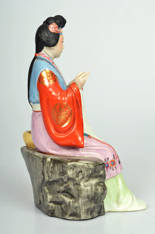 Porcelain figure Chinese girl with embroidery